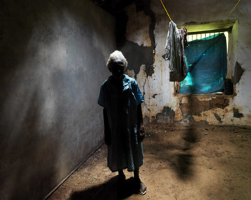 Woman And Blue Curtain