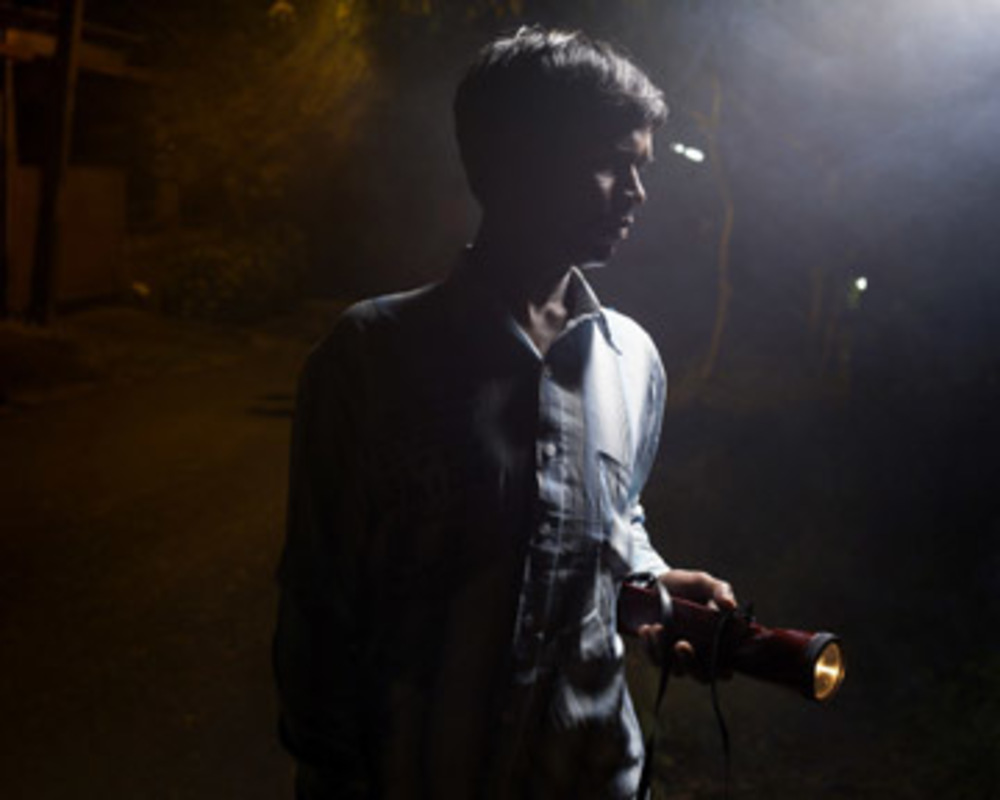 Man With Flashlight